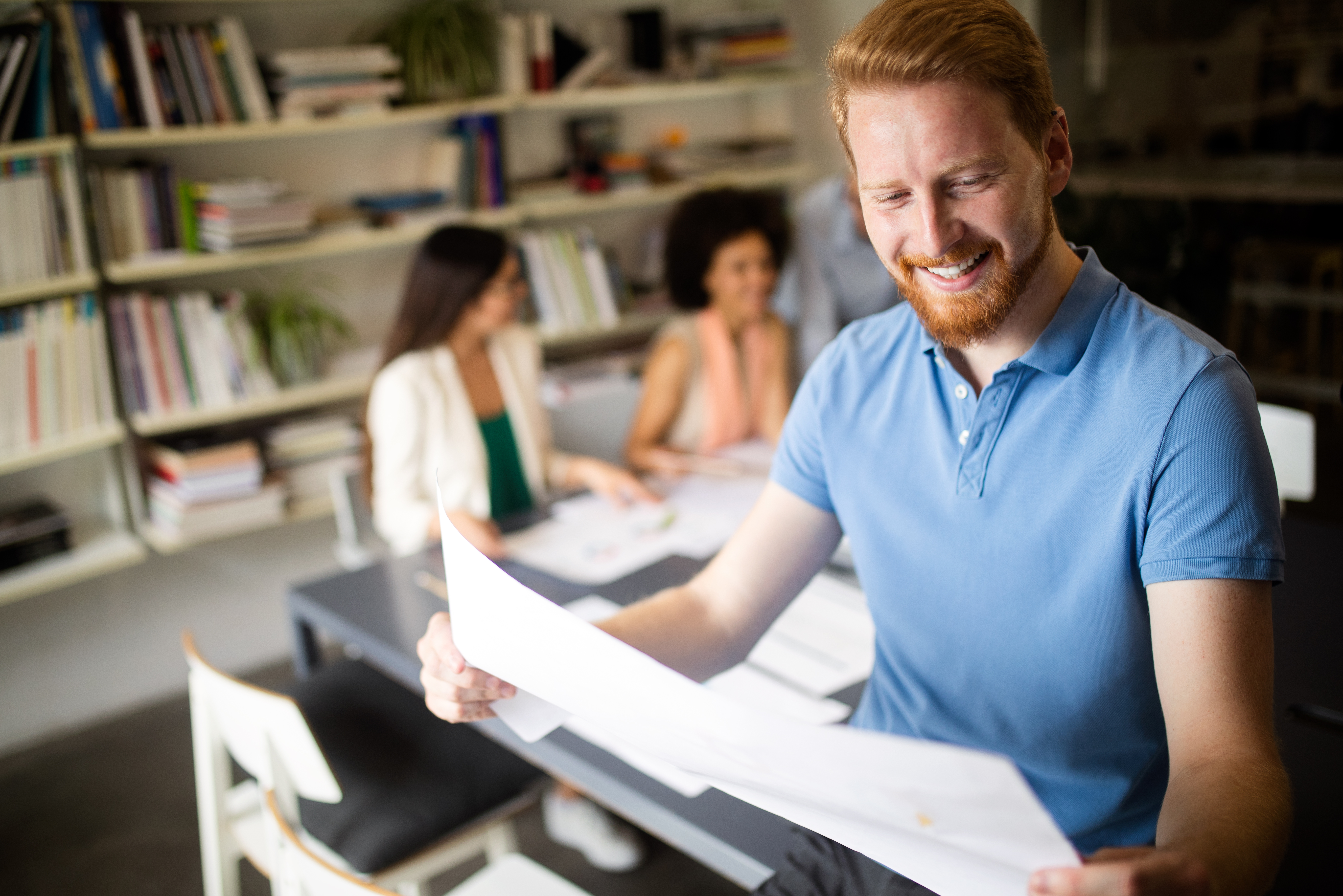 Creative business people working on business project in office