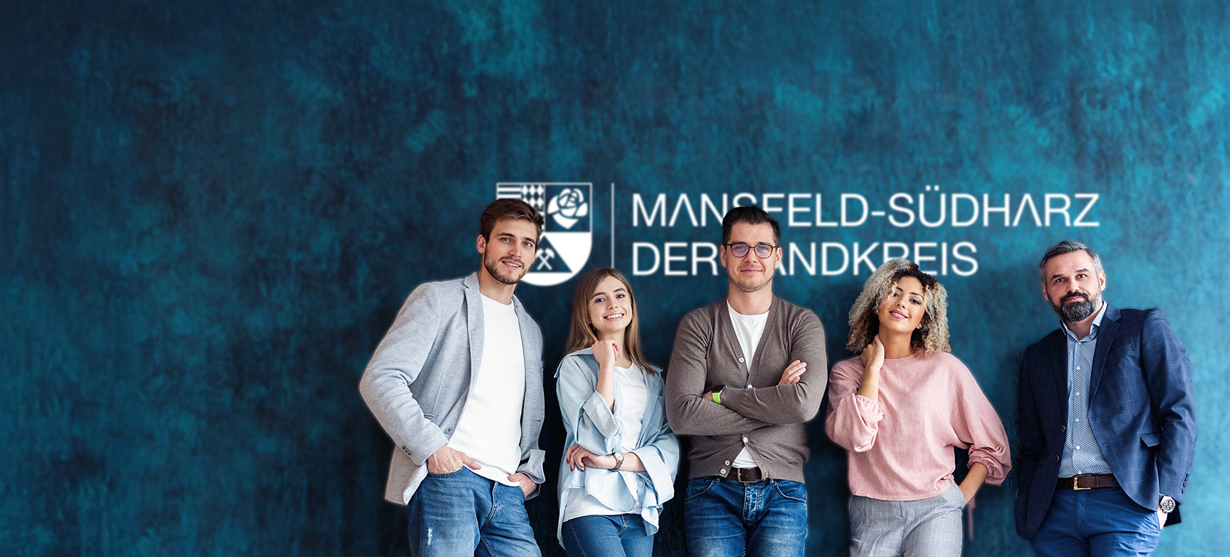 Portrait of creative business team standing together and laughing. Multiracial business people together at startup